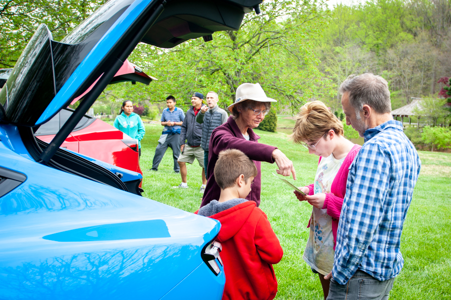 People learning about EVs at a poolesville green event