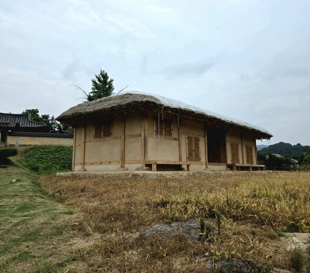 Rustic traditional Korean hanok with thatched roof in Andong-si, South Korea.